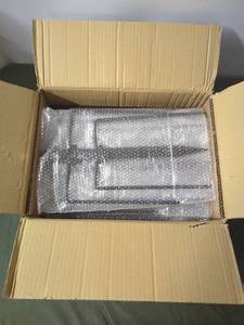 lot 12 image: Set of 4 Stainless Steel Rotisserie Forks in Opened Box