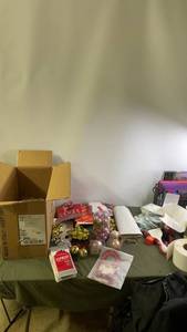 lot 28 image: Assorted Christmas Decorations, Ornaments, and Gift Wrap