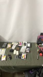 lot 99 image: Assorted Phone Accessories Bundle - Cases, Chargers, and Battery Packs