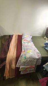 lot 124 image: Assorted 84 Curtain Collection with Unicorn Print and Solid Colors