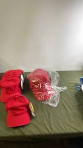 lot 141 image: Lot of 24 Flexfit Red Baseball Caps