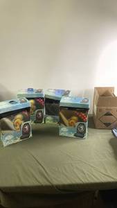 lot 146 image: Set of 4 Tinkerbell Themed Telephones with Original Packaging
