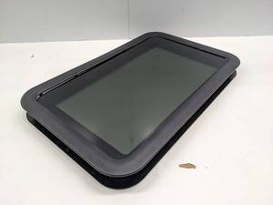 lot 35 image: RV WINDOW WITH SHADE