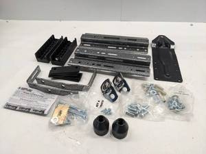 lot 114 image: CAMPER TIEDOWN SET