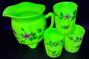 lot 36 image: Antique Tarentum Glass Floral Custard Glass Pitcher and 3 Tumblers - Uranium Glass