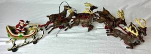lot 84 image: Vintage Cast Iron Christmas Santa Sleigh with 8 Reindeer