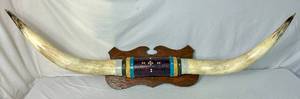 lot 13 image: Pair of Texas Longhorn Mounted Horns Joined by Leather and Stud Accents