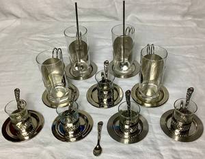 lot 57 image: Vintage MCM Danish Modern Hot Toddy 10 Piece Set & Demi Tasse Silverplate Espresso 16 Piece Set