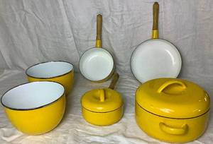 lot 66 image: Vintage 8 Piece Yellow Enamel Cookware Set