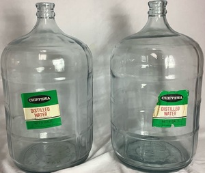 lot 94 image: 2 Vintage Chippewa Distilled Water 5 Gallon Glass Water Bottles
