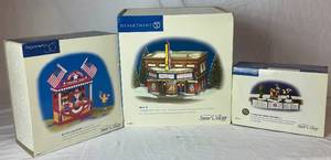 lot 243 image: Snow Village Department 56 Cinema 56, Looney Tunes Animation Film Festival and Uncle Sams Fireworks Stand