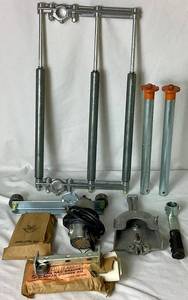 lot 180 image: Vintage Alaskan Jr. Chainsaw Mill Model G758759 and Vintage Craftsman Chainsaw Sharpener Model 315.365710 1.2 amps 24,000 rpm
