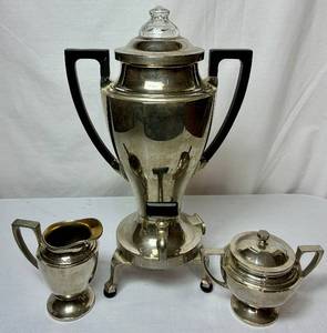 lot 213 image: Three Piece Universal Landerg Frary & Clark E9169A Silver Plate Coffee Set