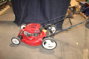 lot 44 image: Used Toro 6.5 HP Gas Lawn Mower with Bag