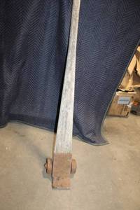 lot 54 image: Vintage Industrial Steel Beam with Rusted Cast Iron Wheels