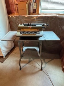 lot 2 image: Olivetti Editor 2 Electric Typewriter - WORKS & Metal Desk on Wheels