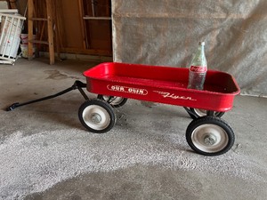 lot 129 image: Our Own Flyer Radio Flyer Wagon & Glass Coke Bottle
