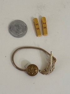 lot 62 image: Military Pin, Coin, Bra Slip Holder