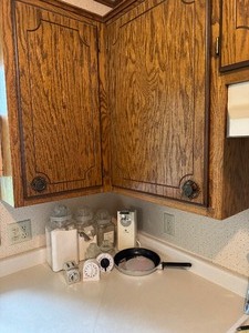 lot 69 image: Contents of Counter & 2 Cupboards