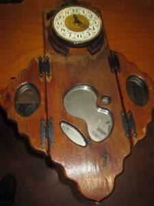 lot 17 image: Well loved wood mirror wall clock w...