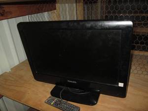 lot 37 image: Phillips 18 Flat screen TV with re...