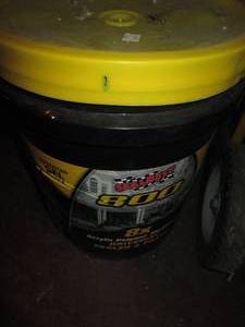 lot 58 image: Sealed 5-gallon bucket of SealBelt ...