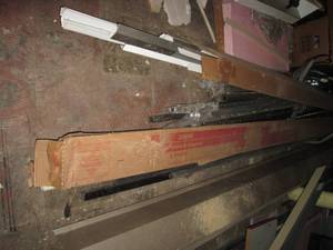 lot 81 image: Variety of wood trim, metal corners...