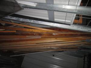 lot 84 image: Large gathering of wood trim and ce...