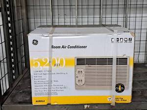 lot 561 image: GE 5200-BTU Room Air Conditioner Unit (in original packaging)