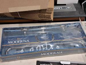 lot 613 image: Moderna Bath Set - 24 Towel Bar, Toilet Paper Holder, Towel Ring, Robe Hook 4-piece