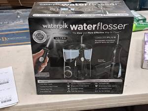 lot 615 image: Waterpik Waterflosser Cordless Tooth Care System