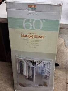 lot 618 image: Clotheskeeping 60 Storage Closet