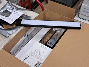 lot 685 image: Lot of (Set of 4) Undercabinet Light Bars with (2) Remote Controls CP-CL02 (in original packaging)