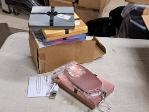 lot 693 image: Lot of (4) Pocket Zoom Rechargers (in original packaging)