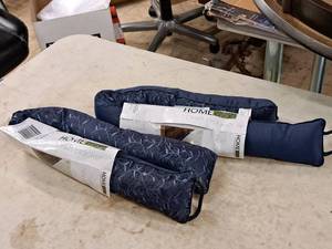 lot 645 image: Lot of (2) Home Basics Draft Blockers (in original packaging)