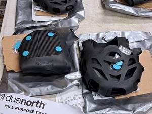 lot 680A image: Lot of (2 Sets) Due North All-Purpose Traction Aids - Medium and Small