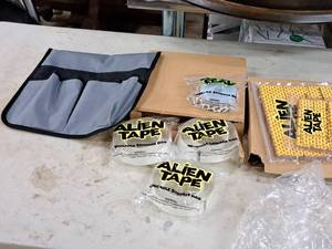 lot 771 image: Assorted Alien Tape Rolls, Bags, Seals Carry Pouch