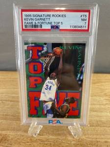 lot 21 image: 1995 Signature Rookies Kevin Garnett Card PSA 7 J