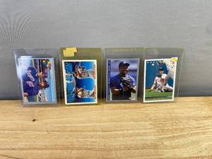 lot 269 image: Collection of 4 Kirby Puckett Baseball Cards with Protective Sleeves J