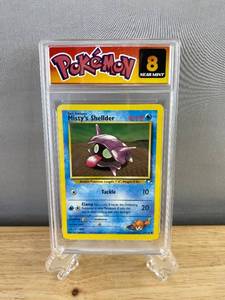 lot 25D image: Mistys Shellder Pokemon Card - Graded 8 Near Mint Condition T