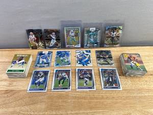 lot 296 image: Collection of NFL Football Trading Cards Including Lamar Jackson and Bruce Smith J