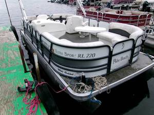 lot 3 image: 2015 Palm Beach Ultra Sport RL220 223 Pontoon W25HP Mercury EFI 4 Stroke Outboard Motor