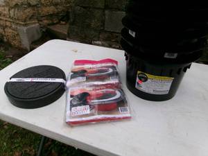 lot 116 image: 7- 9 Catchcover Ice Hole Sleeves & 2- Bobber Buddy Hole Cozy (NOS)
