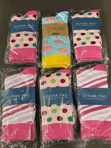 lot 21 image: Set of 12 Pairs Luther Pike Seattle Novelty Socks