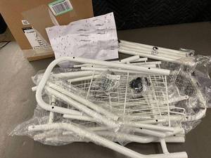 lot 23 image: White Over The Toilet Storage Rack with Assembly Instructions