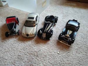 lot 36 image: Four Vintage Die Cast Cars 118 Scale