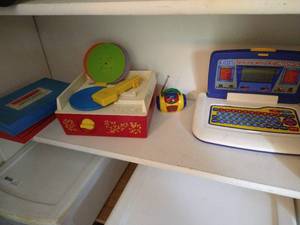 lot 44 image: Shelf of Vintage Toys & Fisher Price Record Player