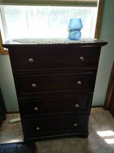 lot 51 image: Espresso Four-Drawer Dresser- Like New