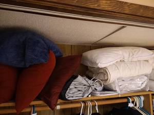 lot 65 image: Upper Shelf of Pillows, Electric Blanket, Air Mattress