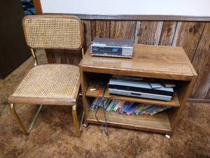 lot 68 image: Rolling Shelf w VCR, VHS Tapes, AlarmRadio & Chair